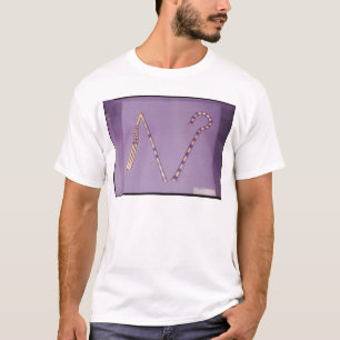 Camiseta Trapaceiro e flail, do túmulo de Tutankhamun