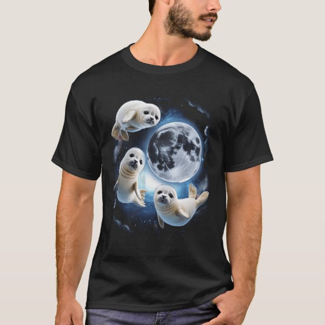 Camiseta Três Belas Festas De Bebê Lua 3 Focas Cama Estranh (Frente)