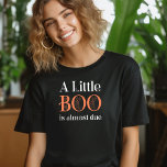 Camiseta Um Pequeno Boo Está Quase A Vencer O Halloween<br><div class="desc">Um Pequeno Boo é quase uma camisa perfeita para mamãe a ser ou gênero que revela hospedagem, lançamento de gravidez no outono ou chá de fraldas temático no halloween. "Um Pequeno Boo está quase vencendo" é escrito em letras assustadoras cotejadeiras em laranja e branco. Se quiser alterar as cores, você...</div>