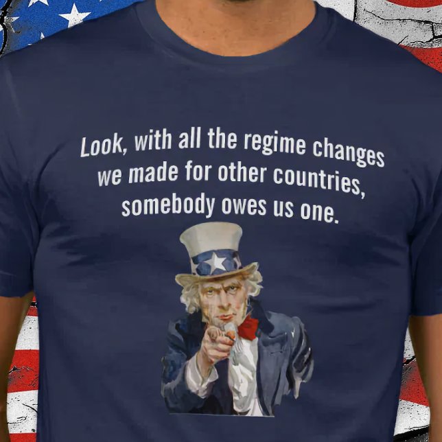 Camiseta US Says Someone Owes Us a Regime Change (World Owes US a Regime Change.)