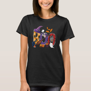 Camiseta Vaca de Halloween de Boo montando a vassoura da br