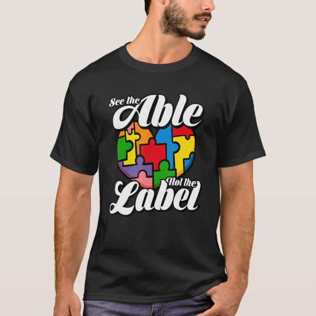 Camiseta Veja O Able Not The Label Quebra-cabeça Autism Con (Frente)