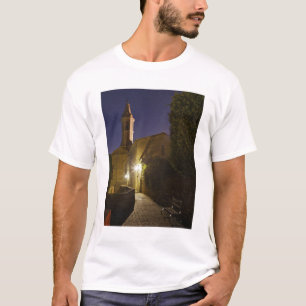 Camiseta Vista noturna da igreja ao anoitecer, Pienza, Itál