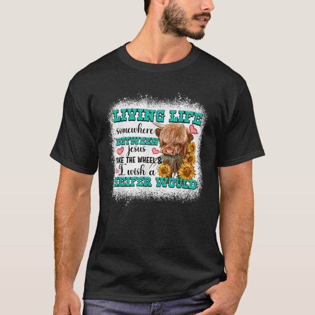 Camiseta Vivendo Em Algum Lugar Entre Jesus Leva A Roda (Frente)