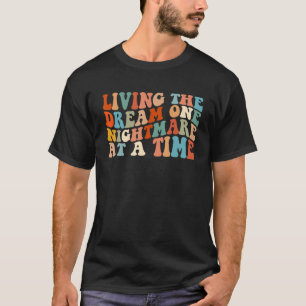Camiseta Vivendo O Sonho Um Pesadelo De Cada Vez