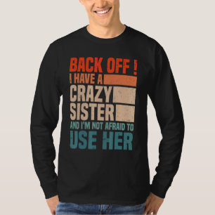 Camiseta Volte atrás Eu Tenho Uma Irmã Louca Não Tenho Medo
