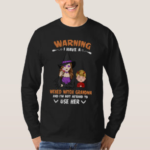 Camiseta Vovô Adverte Eu Tenho Uma Vovó De Bruxa Má