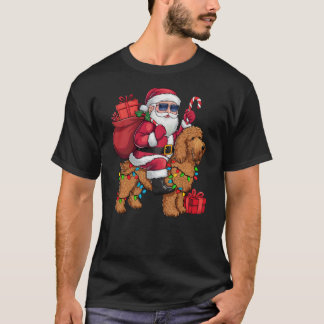Camiseta Xmas Lighting Santa Riding Goldendoodle Dog Christ