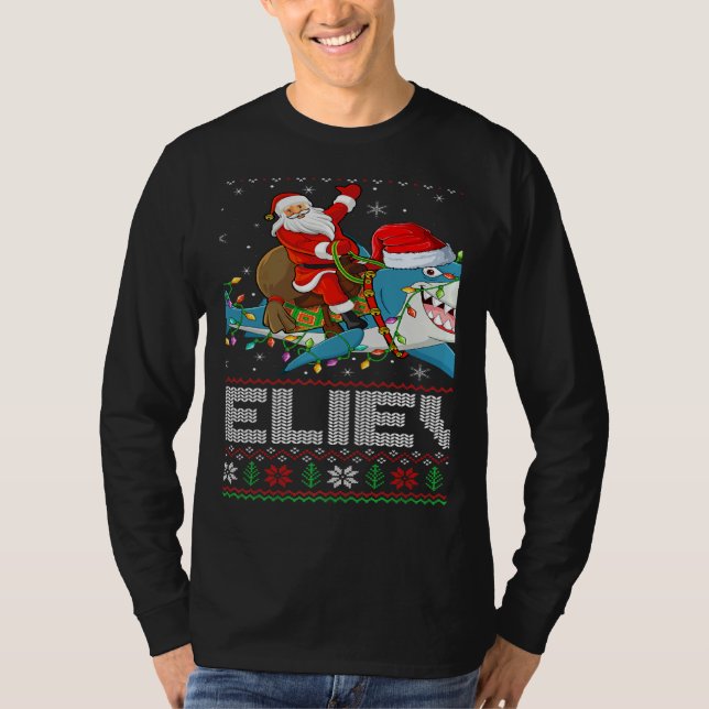 Camiseta Xmas Lights Shark Believe Ugly Santa Riding Shark  (Frente)