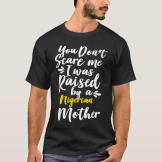 Camiseta You Don't Scare Me I Was Raised By A Nigerian