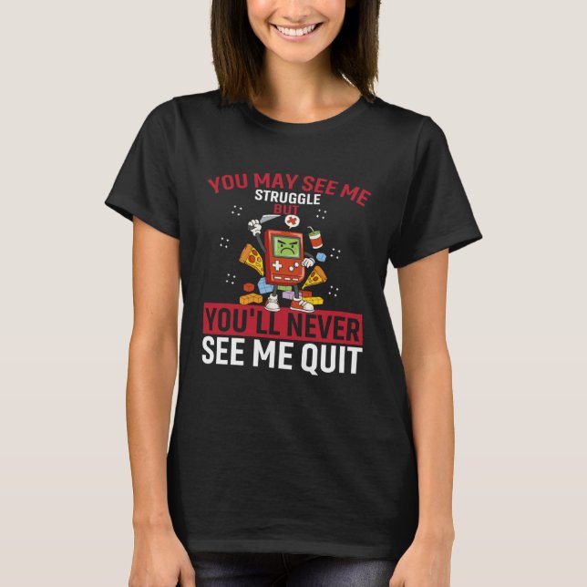Camiseta You May See Me Struggle But You ll Never See Me Qu (Frente)
