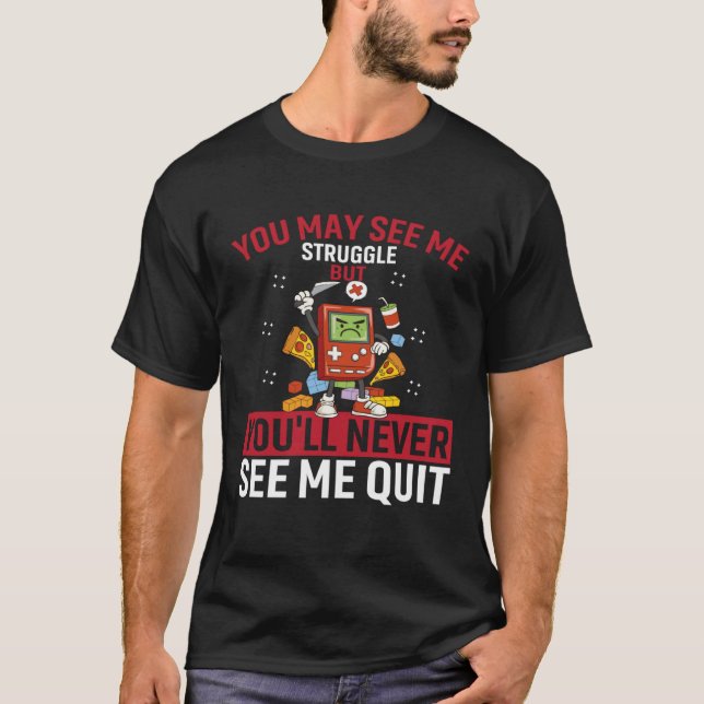 Camiseta You May See Me Struggle But You ll Never See Me Qu (Frente)
