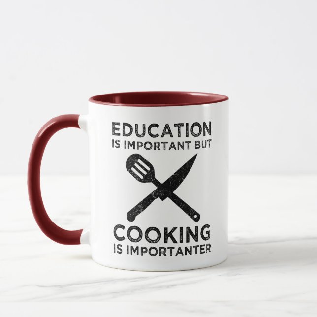 Caneca A Educação É Importante, Mas O Cozinhar É Importan (Esquerda)