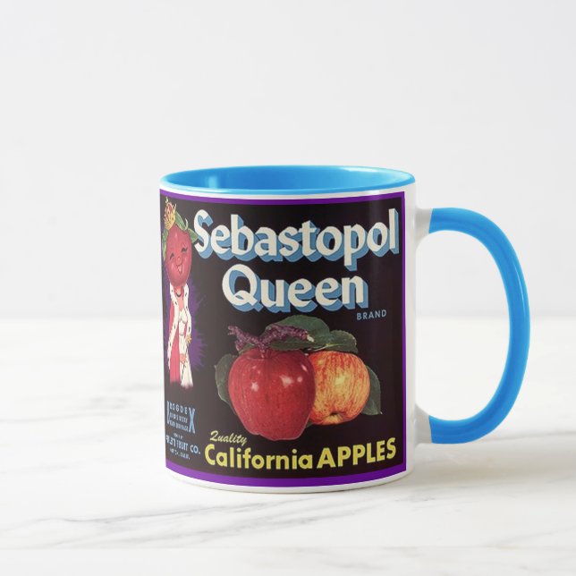 CANECA AGRIDA A ETIQUETA DA CAIXA DA RAINHA APPLE DE (Direita)