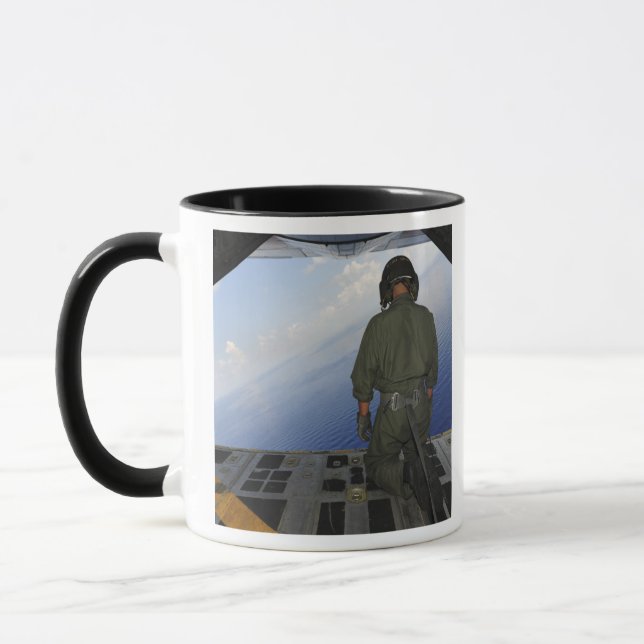 Caneca Airman observa as águas do Golfo do México (Esquerda)