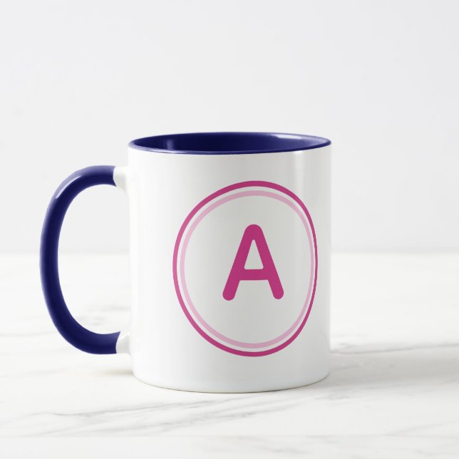 Caneca Alfabeto de Letra Redonda Design de Círculo Rosa (Esquerda)