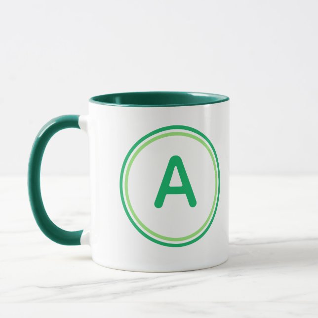 Caneca Alfabeto de Letra Redonda Design de Círculo Verde (Esquerda)