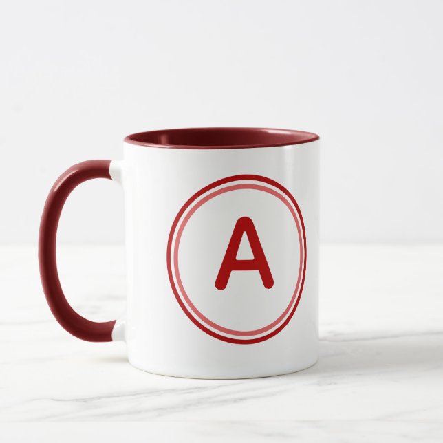Caneca Alfabeto de Letra Redonda Design de Círculo Vermel (Esquerda)