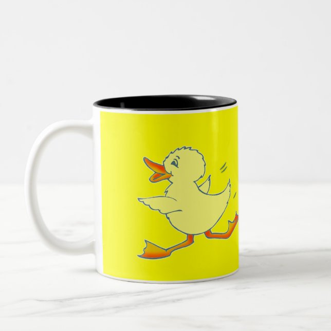 Caneca amarela brilhante do pato de Quackers (Esquerda)