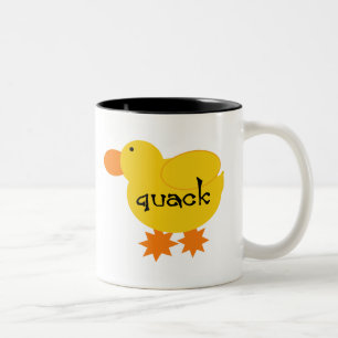 Caneca amarela do grasnado do pato
