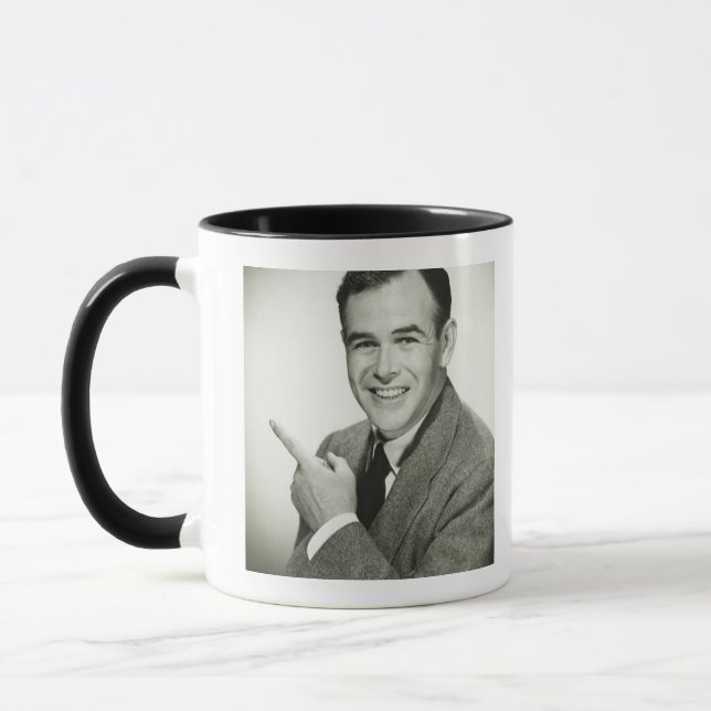 Caneca Apontar do homem de negócios (Esquerda)