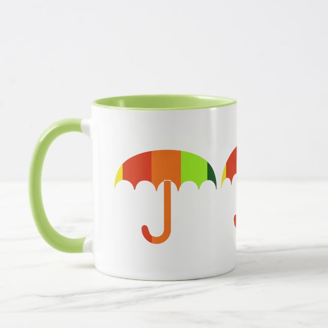 Caneca Arco-Íris Guarda-chuvas no fundo branco (Esquerda)