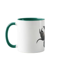 Caneca| Dois gatos mentem com uma planta