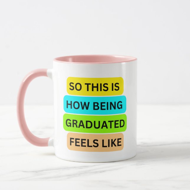 Caneca Caneta combo rosa SO_IS_HOW_BEING_GRADUATED_FEEL (Esquerda)
