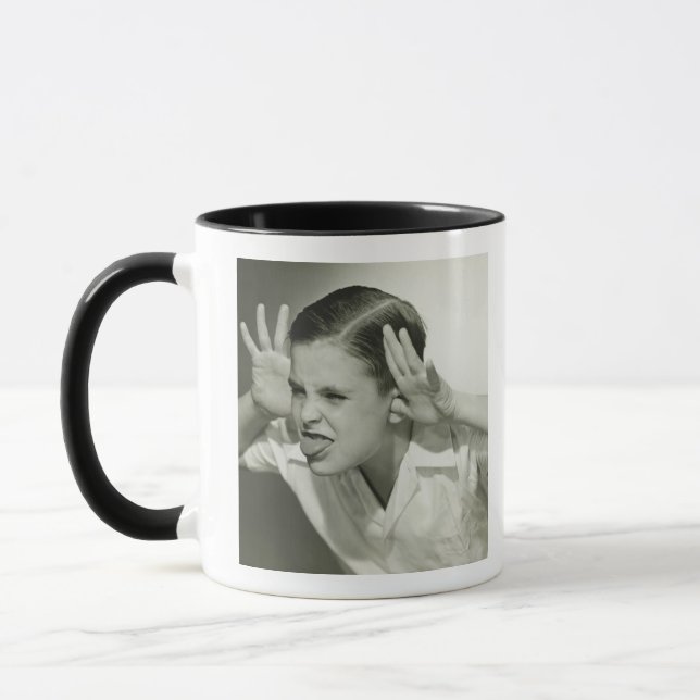 Caneca Cara do fazer do menino (Esquerda)