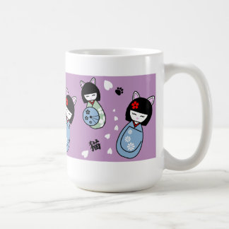 Caneca cerâmica do gatinho de Kokeshi