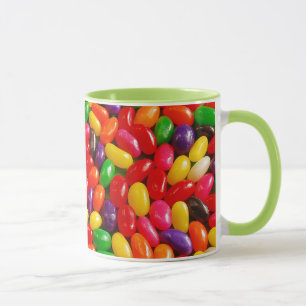Caneca colorida do teste padrão do jellybean