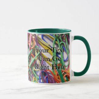 Caneca colorida dos clipes
