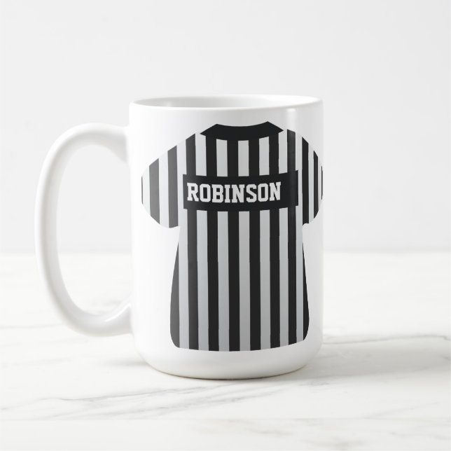 Caneca conhecida do árbitro (Esquerda)