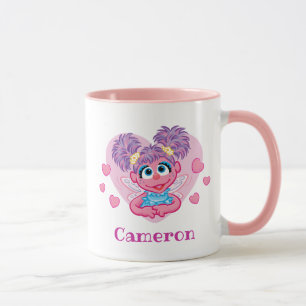 Caneca Corações de São Valentão da Abby Cadabby Gráficos