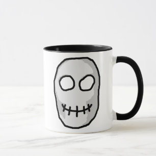 Caneca Crânio cinzento e preto de pedra. Estilo primitiv