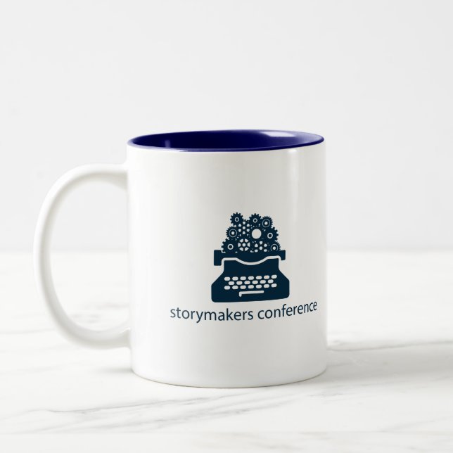 Caneca da conferência de Storymakers (Esquerda)