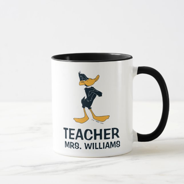 Caneca DAFFY DUCK™ com professor cruzado de armas (Direita)