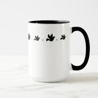 Caneca das pombas do vôo