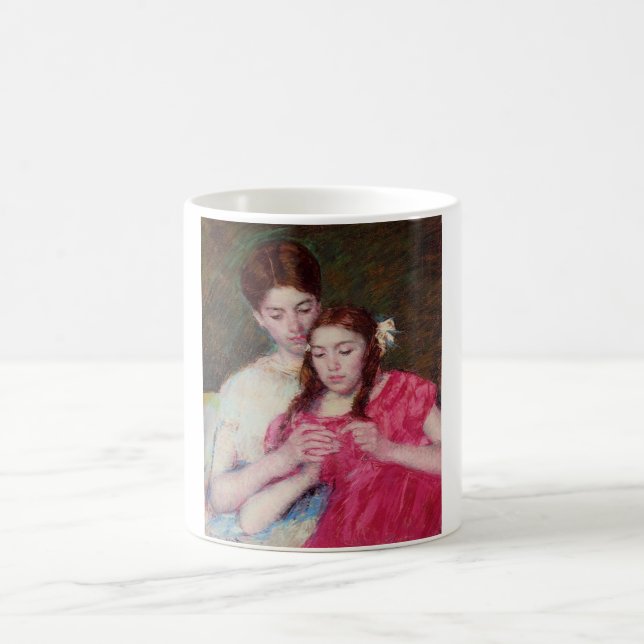 Caneca De Café A lição de crochê (duas irmãs) (Centro)