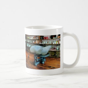 Caneca De Café Balança na Loja de Variedades