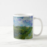 Caneca De Café Campos de trigo verde por Vincent van Gogh<br><div class="desc">Green Wheat Fields de Vincent van Gogh é uma pintura típica de paisagens de apos impressionismo de arte. Campos de fazenda de trigo em cores verdes e lindos céus azuis com nuvens fluffy girantes durante a estação de primavera. Sobre o artista: Vincent Willem van Gogh (1853-1890) foi um dos mais...</div>