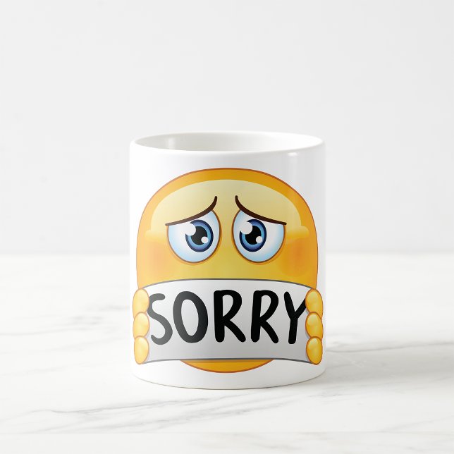 Caneca De Café Cara de Emoji Triste Desculpe Segurando Placa de D (Criador carregado)
