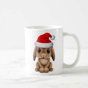 Caneca De Café Coelho do bebê que veste um chapéu do papai noel