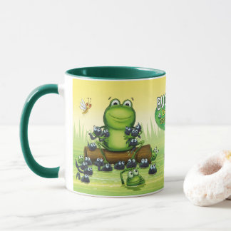 Caneca de café com desenho de rãs