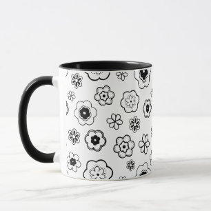 caneca de café com flores de desenho animado