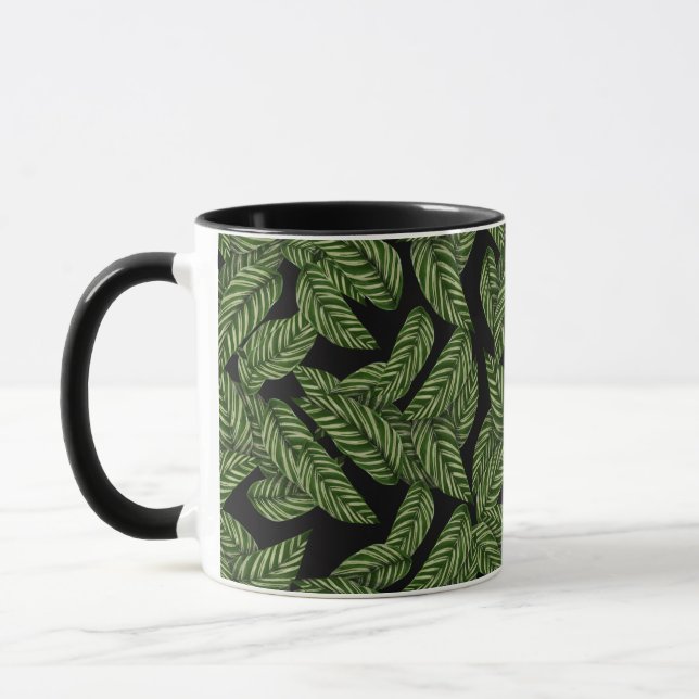 caneca de café com folhas da selva (Esquerda)