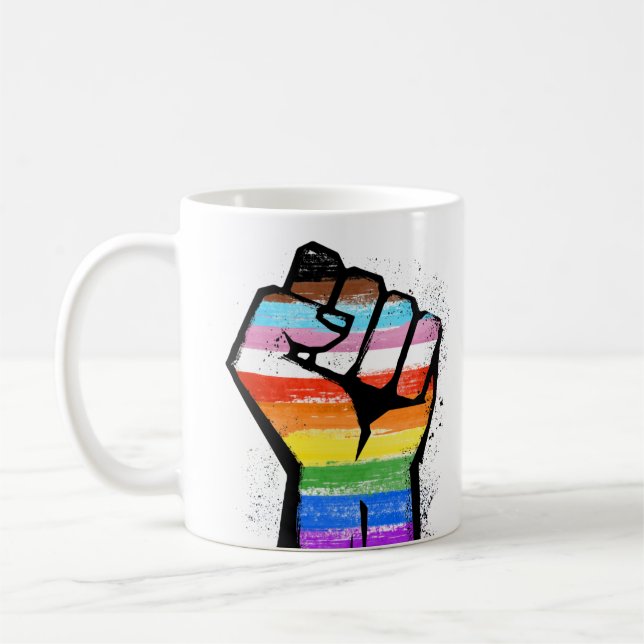 CANECA DE CAFÉ COM PUNHO FECHADO DE ORGULHO DE PRO (Esquerda)