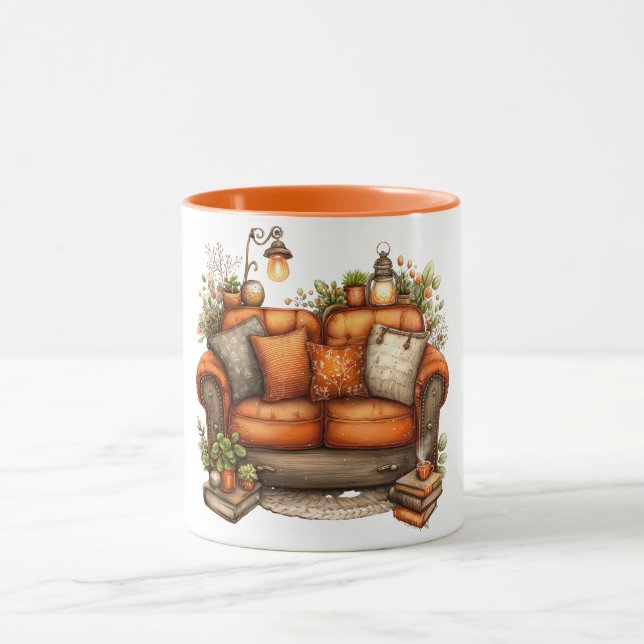 Caneca de café com tons quentes de sofá e flores (Centro)