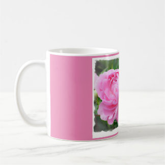 Caneca de café cor-de-rosa com uma fotografia de