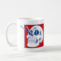 Crânio de artista com lápis e pincéis